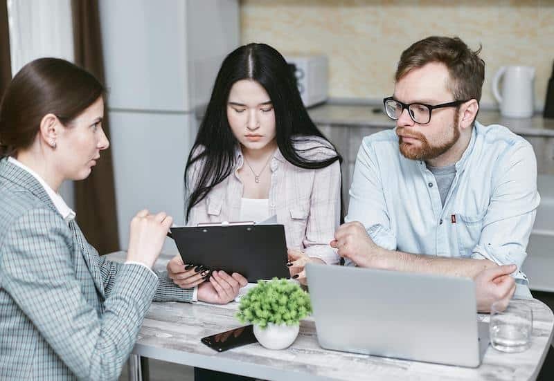 
Booked Travels' staff explaining to the clients how easy to file a claim.